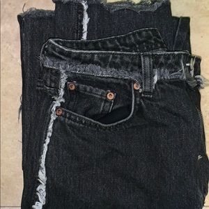 Ashy black jeans with raw hems